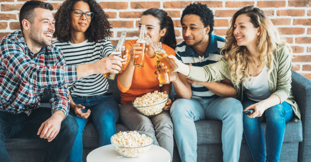istock Group of friends watching tv 1144991987