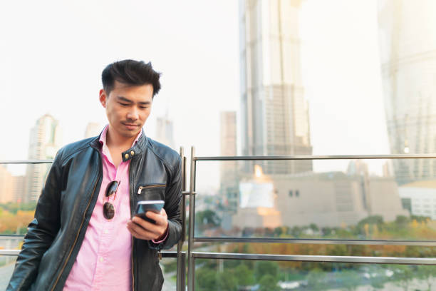 istock Calling Someone To Enjoy With Him 1144992774
