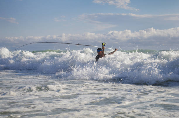 Sea fishing, surf fishing stock photo