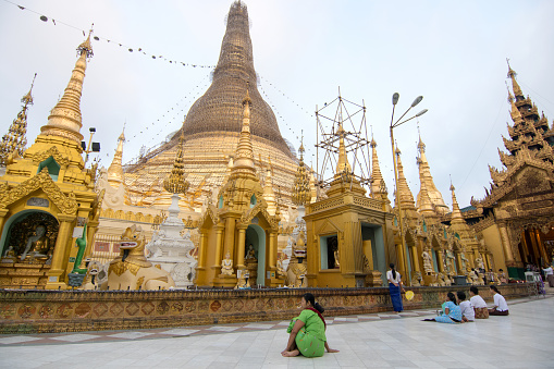 Visitors pray at the Shwedagon Pagoda which is one of the most famous pagodas in the world and has been the main attraction of Yangon.