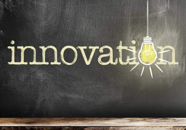 istock word innovation on chalkboard with glowing light bulb symbolizing and idea 1144996944
