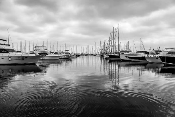 Yachts in a harbour in Turkey. Black and white. Copy space. Yachts in a harbour in Turkey. Black and white. Copy space sailboat mast stock pictures, royalty-free photos & images