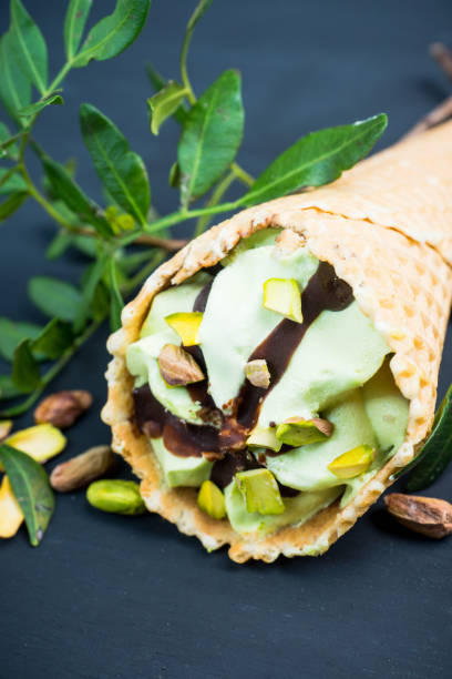 istock Fresh pistachios ice cream on the rustic background 1145001271
