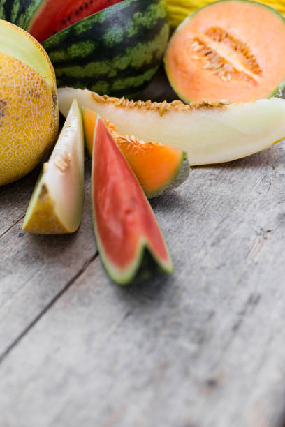 istock fresh colorful melon slices on a wooden table 1145002807