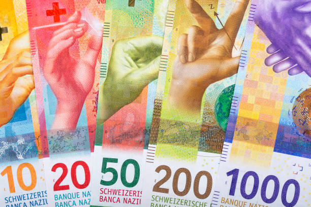 new swiss francs, a business background - swiss currency imagens e fotografias de stock