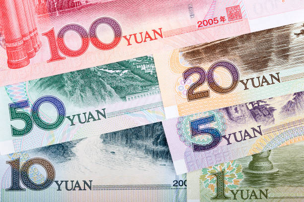 istock Chinese yuan, a business background 1145005355