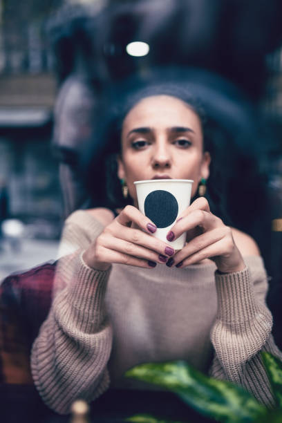 istock Modern Female Enjoying Take Away Coffee 1145011275