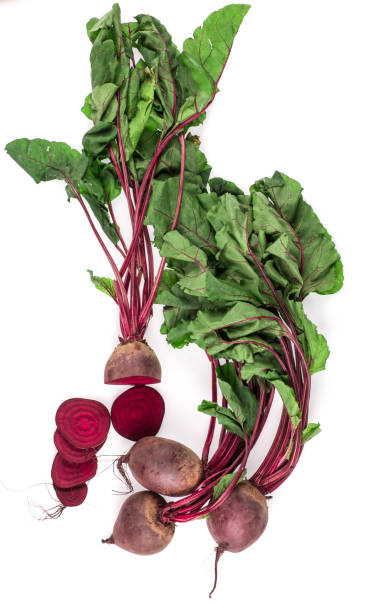 istock fresh beets with green leaves isolated on white background 1145011975