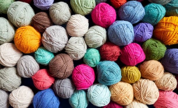 istock Colorful background made of wool yarn balls. 1145013118