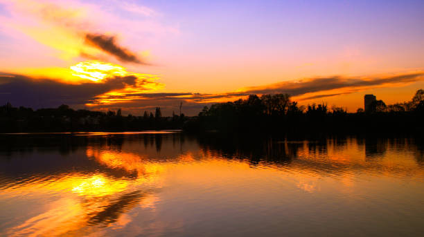 istock Nice symmetry of clouds reflected in the water 1145014589