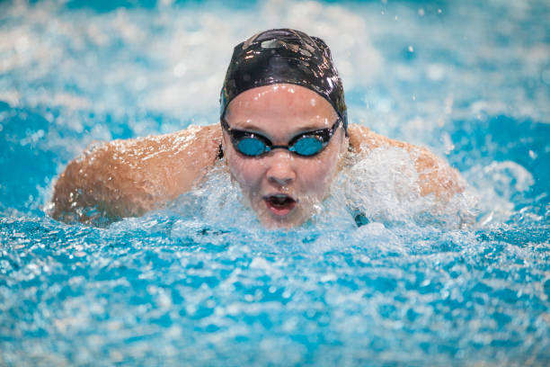 istock Female swimmer - butterfly stroke 1145015661