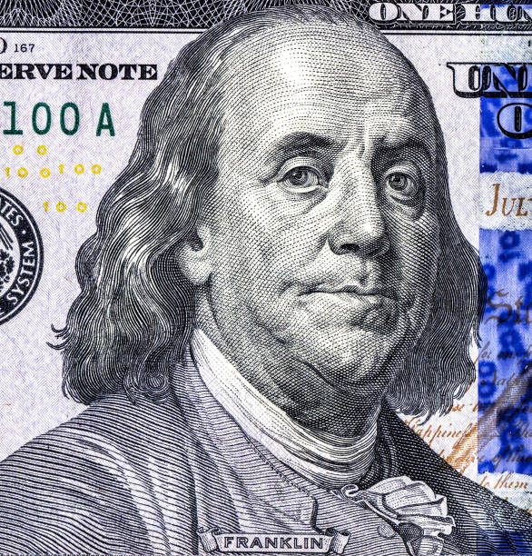istock Franklin portrait from 100 american dollar banknote 1145016192