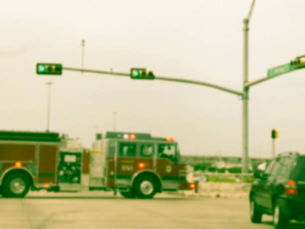 istock Filtered image blurry background accident at road intersection with fire truck 1145016570