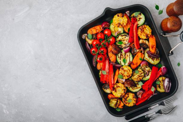 istock Grilled vegetables in a cast iron pan. Top view. 1145017665