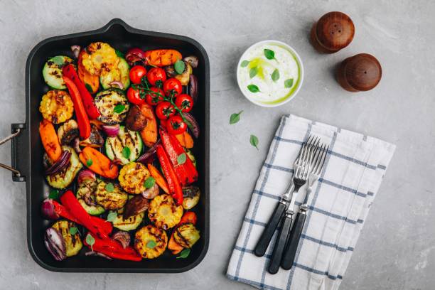 istock Grilled vegetables in a cast iron pan. Top view. 1145017716