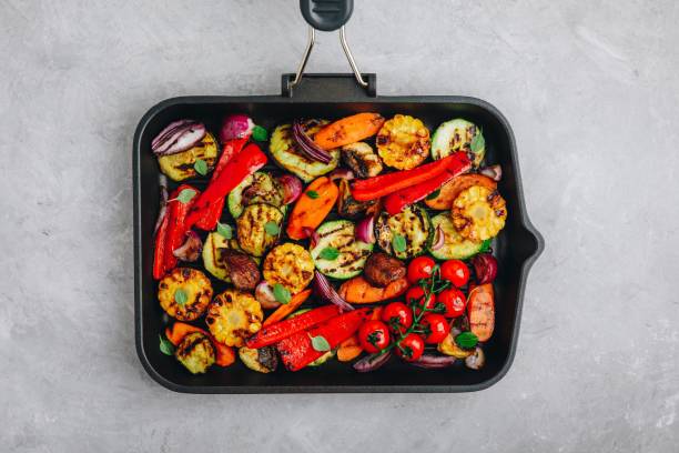 istock Grilled vegetables in a cast iron pan. Top view. 1145017734