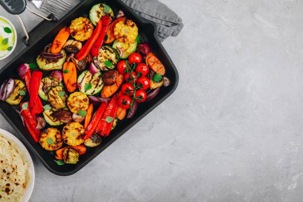 istock Grilled vegetables in a cast iron pan. Top view. 1145017809