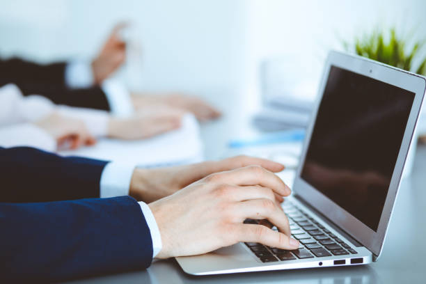 istock Group of business people working together in office 1145017980