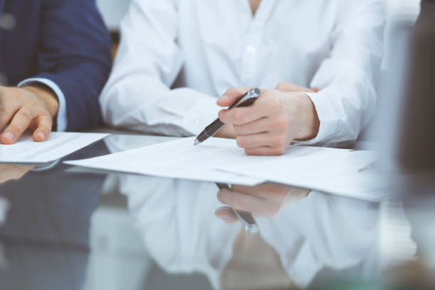 istock Bookkeepers team or financial inspectors  making report, calculating or checking balance. Group of people at work. Business operations concept. 1145018191
