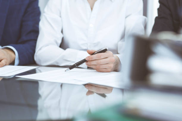 istock Bookkeepers team or financial inspectors  making report, calculating or checking balance. Group of people at work. Business operations concept. 1145018199