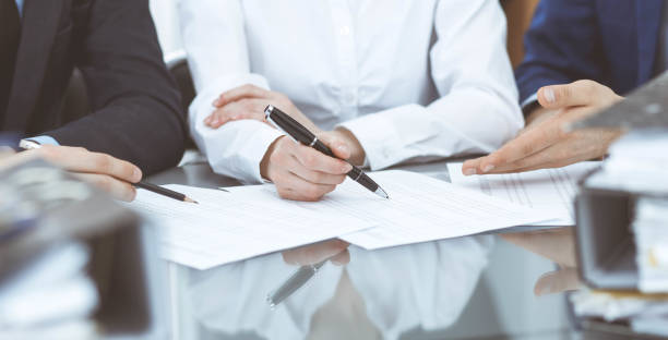 istock Bookkeepers team or financial inspectors  making report, calculating or checking balance. Group of people at work. Business operations concept. 1145018212