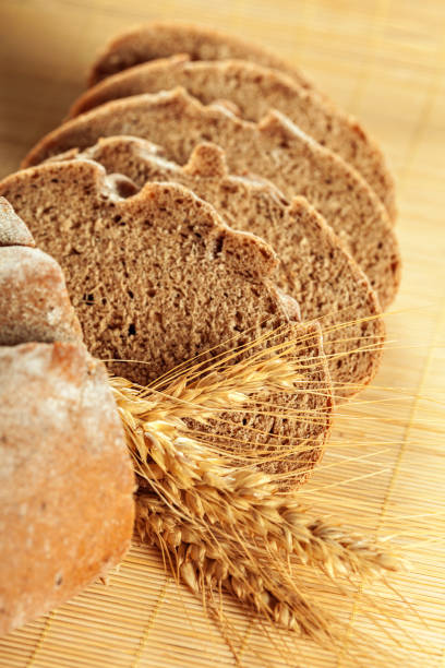 istock Freshly baked bread on wooden table 1145023837