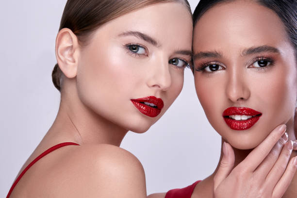 istock women in red with nice make-up 1145027694