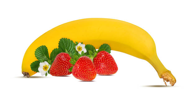 istock Bananas and strawberries isolated on white background with clipping path 1145028203