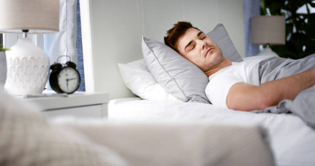 istock The clock will soon rudely wake him 1145030490