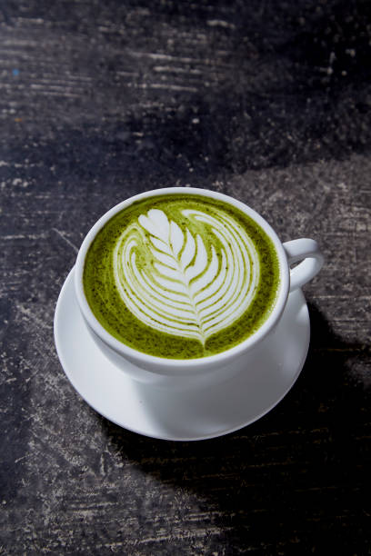 istock A cup of green tea matcha latte On Black Table 1145030912