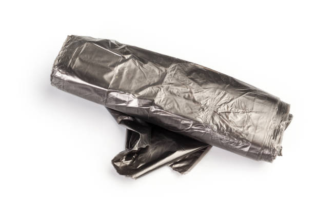 istock roll of plastic garbage bags isolated on white background 1145032337
