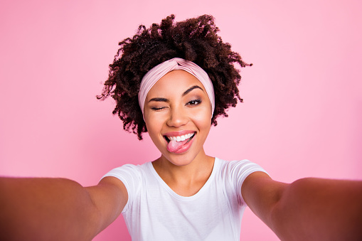Self-portrait of her she nice-looking charming cute winsome attractive lovely cheerful cheery crazy wavy-haired girl having fun isolated over pink pastel background.