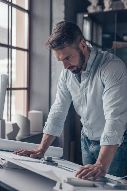 istock Mature man in the workplace 1145032812