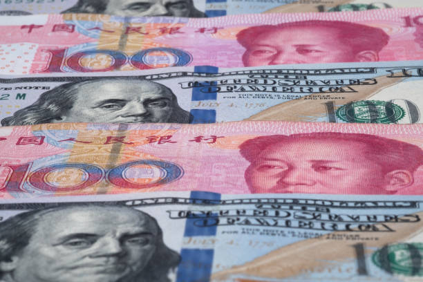 istock Chinese Yuan and US dollar on layers. Trade war concept. Copy space. 1145032835