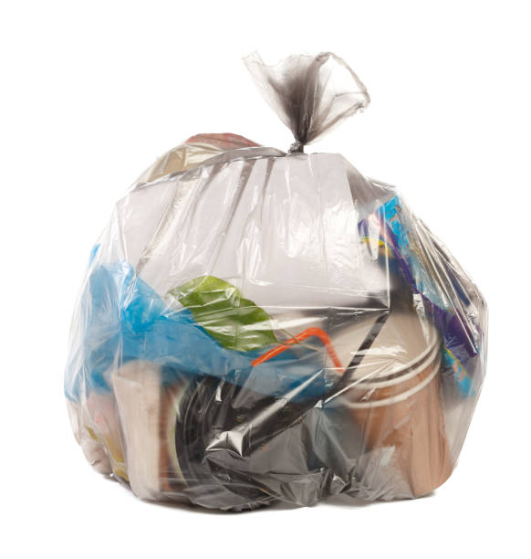 istock Plastic bag full of rubbish on isolated white background 1145032838