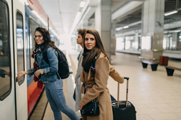 istock Three friends with suitcases travel together 1145036277