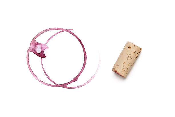 istock Red wine glass stains and wine cork stopper 1145039269