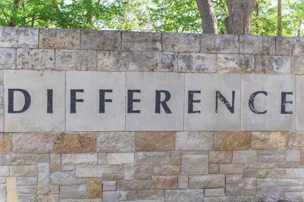 istock Old stone texture of Difference word on wall brick 1145039378