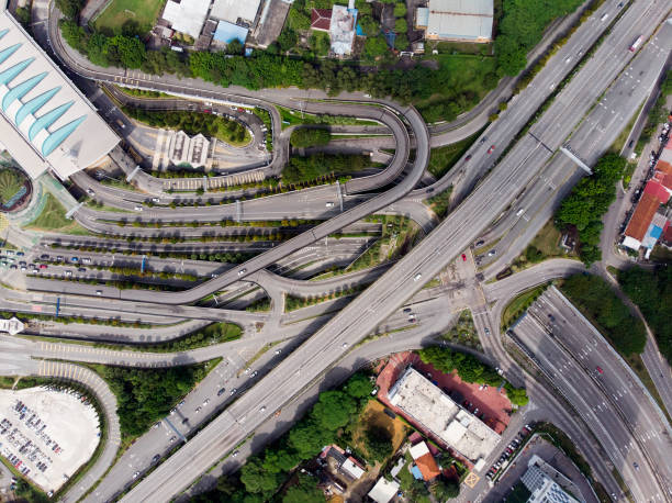 Road flyover over view in the city of Johor Bahru. Johor Bahru, Malaysia - April 20,2019 : Johor Bahru City of Malaysia ariel view. johor photos stock pictures, royalty-free photos & images