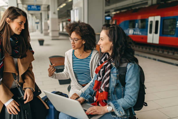 istock Young woman working outdoor at train station 1145040512