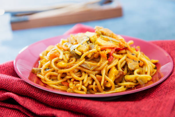 istock Vegetable noodles with chicken meat preparation 1145040962