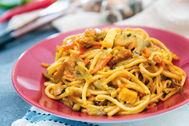 istock Vegetable noodles with chicken meat preparation 1145040974