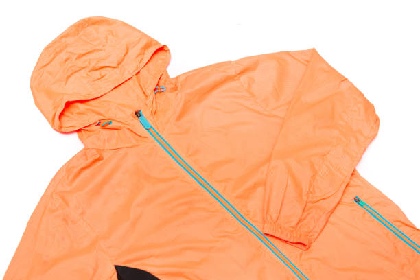 istock yellow-orange windbreaker jacket 1145040978