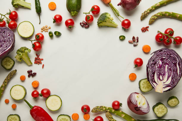istock Flay lay with vegetables and seeds on white surface 1145042062