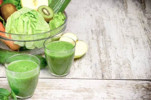 istock Freshly squeezed, blended healthy drink - green smoothie 1145042481