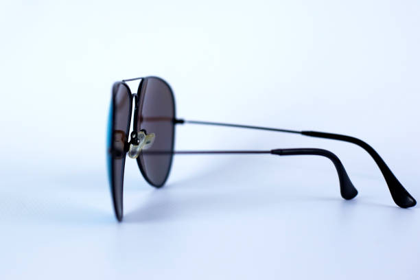 istock Blue mirrored sunglasses with anti-reflective coating and UV protection on a white background. 1145042591