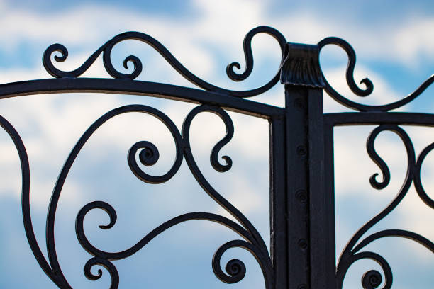 istock beautiful decorative metal elements forged wrought iron gates 1145045473