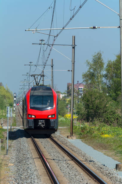 istock Red train entering Waddinxveen new district Triangel Station 1145046474