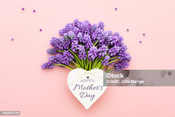 Spring Lilac Flowers And A Heart Shape Card Happy Mothers Day On Pink Stock Photo - Download Image Now