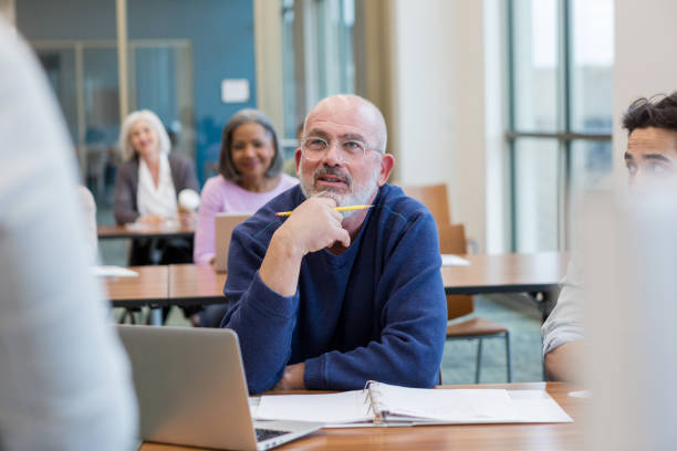 istock A mature adult concentrates in the foreign language class 1145048673
